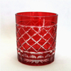 horn shape embossed black and red glass candle jar