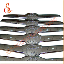 automotive chromed logo prototypes by CNC machining
