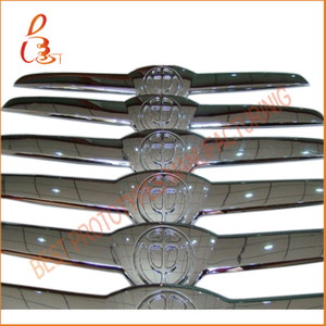 automotive chromed logo prototypes by CNC machining