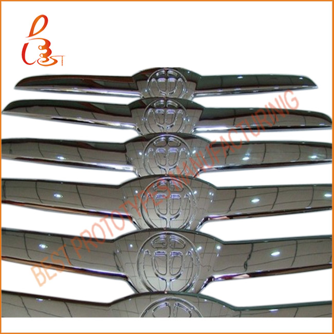 automotive chromed logo prototypes by CNC machining