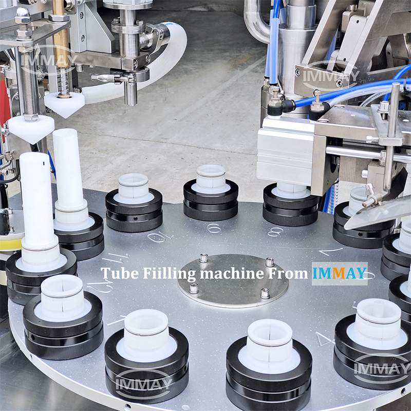 Toothpaste tube filling and sealing machine ماكينة تعبئة وغلق انابيب معجون الاسنان