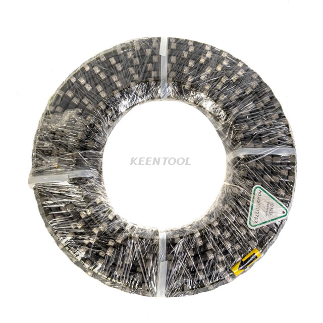 Резка гранитного и мраморного карьеров резиновой и пружинной алмазной проволокой