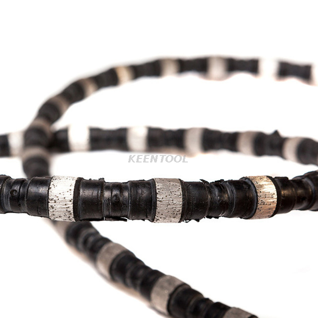 Резка гранитного и мраморного карьеров резиновой и пружинной алмазной проволокой