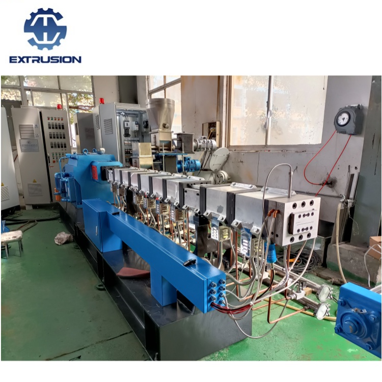 南京海思雙螺桿同向?qū)櫸锸称窋D出機(jī)