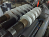 Surface coiling slitting rewinder machine for calcium carbonate film