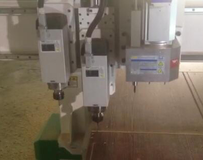 Cnc woodworking machine with drilling head.jpg