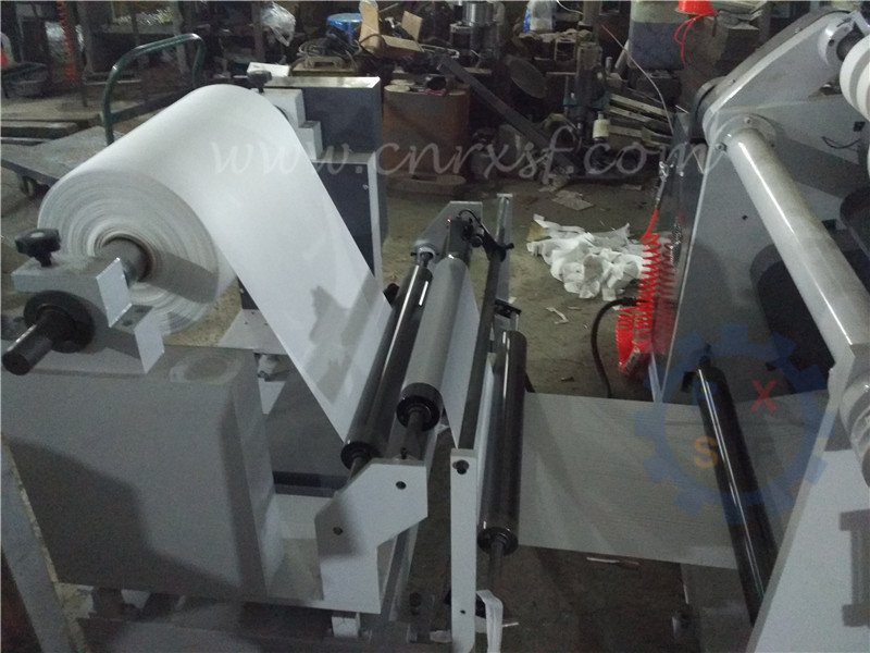 Surface coiling slitting rewinder machine for calcium carbonate film