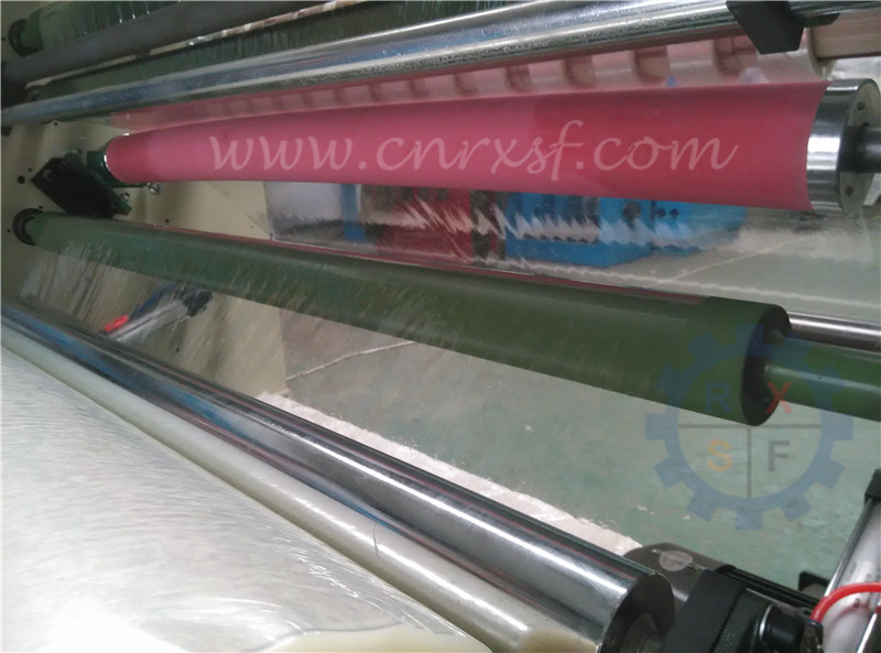 Slitting and rewinding machine for sealing tape