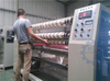 Slitting and rewinding machine for sealing tape