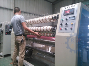 Slitting and rewinding machine for sealing tape