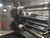 Breathable film slitting and rewinding machine with puncture roller