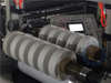 Surface coiling slitting rewinder machine for calcium carbonate film