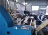 Horizontal type paper slitting and rewinding machine