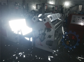 Reflective canvas strip slitting and rewinding machine