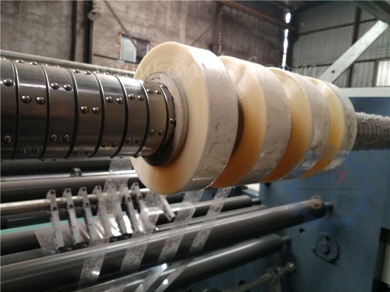Horizontal slitting machine with slip pneumatic shaft rewinder