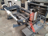 Horizontal slitting machine with slip pneumatic shaft rewinder