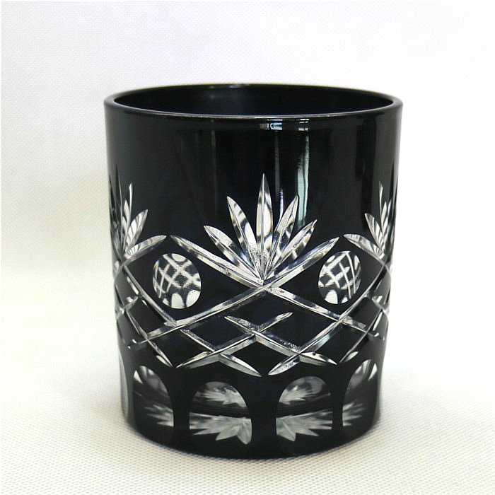 horn shape embossed black and red glass candle jar