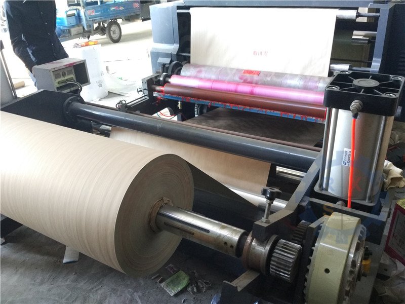Multifunctional flexo printing - cross cutting machine with automatic stacking