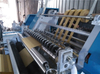 Horizontal type paper slitting and rewinding machine
