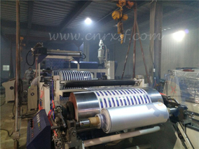 Aluminum-plastic extrusion laminating machine for toothpaste hoses