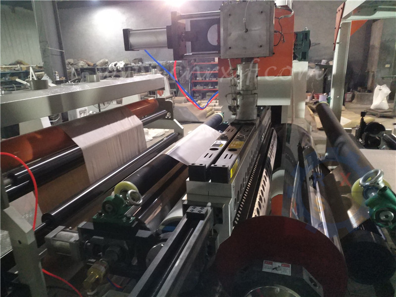 Extrusion coating machine for bag using PP woven fabric