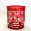 horn shape embossed black and red glass candle jar