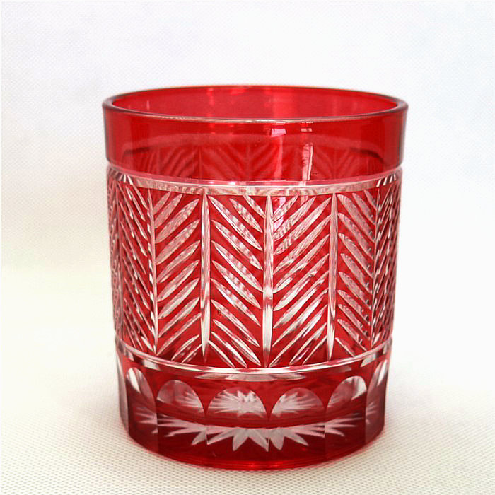 horn shape embossed black and red glass candle jar