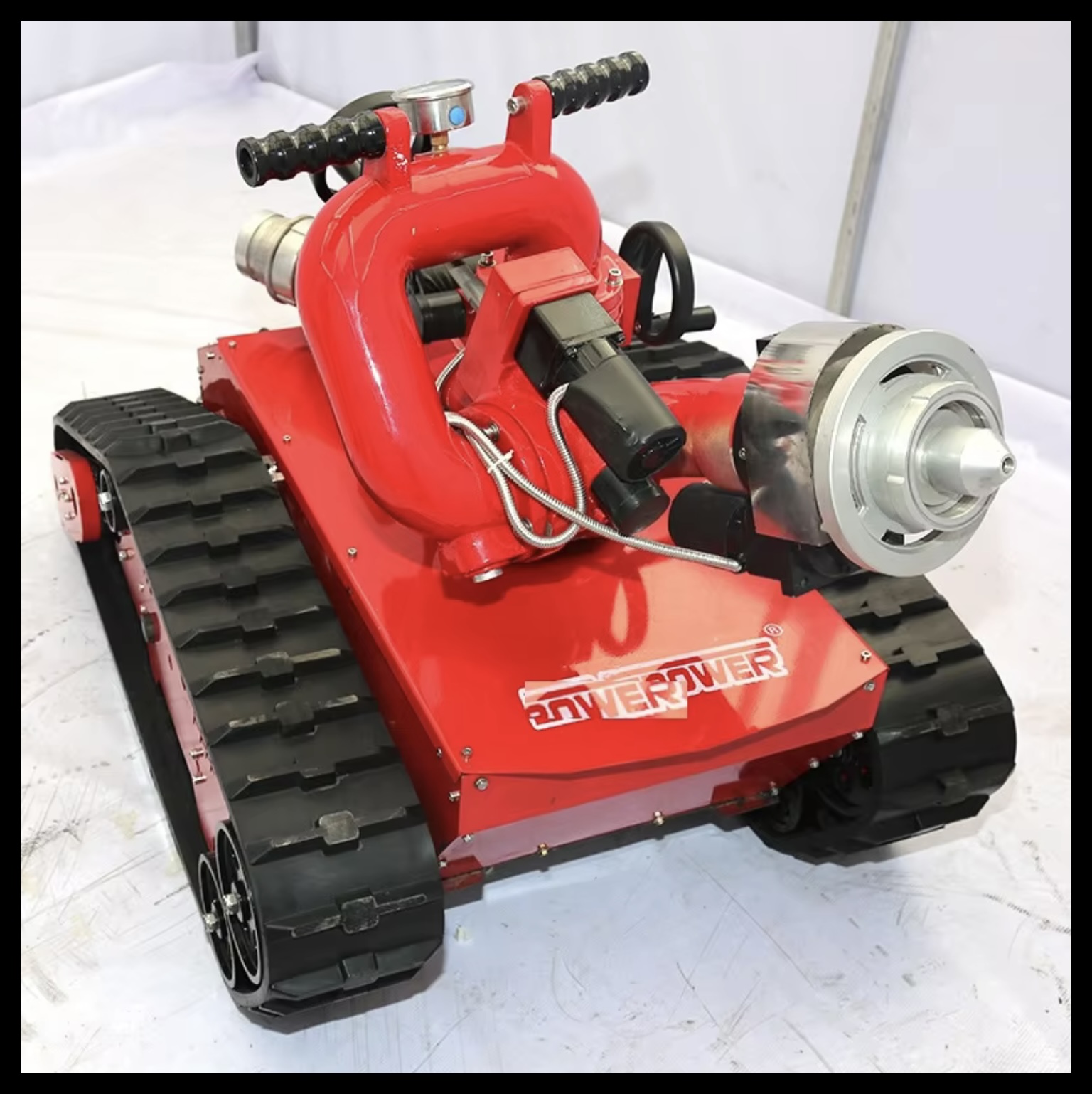 Intelligent Remote-Controlled Firefighting Robot with Tracked Chassis Mobility 