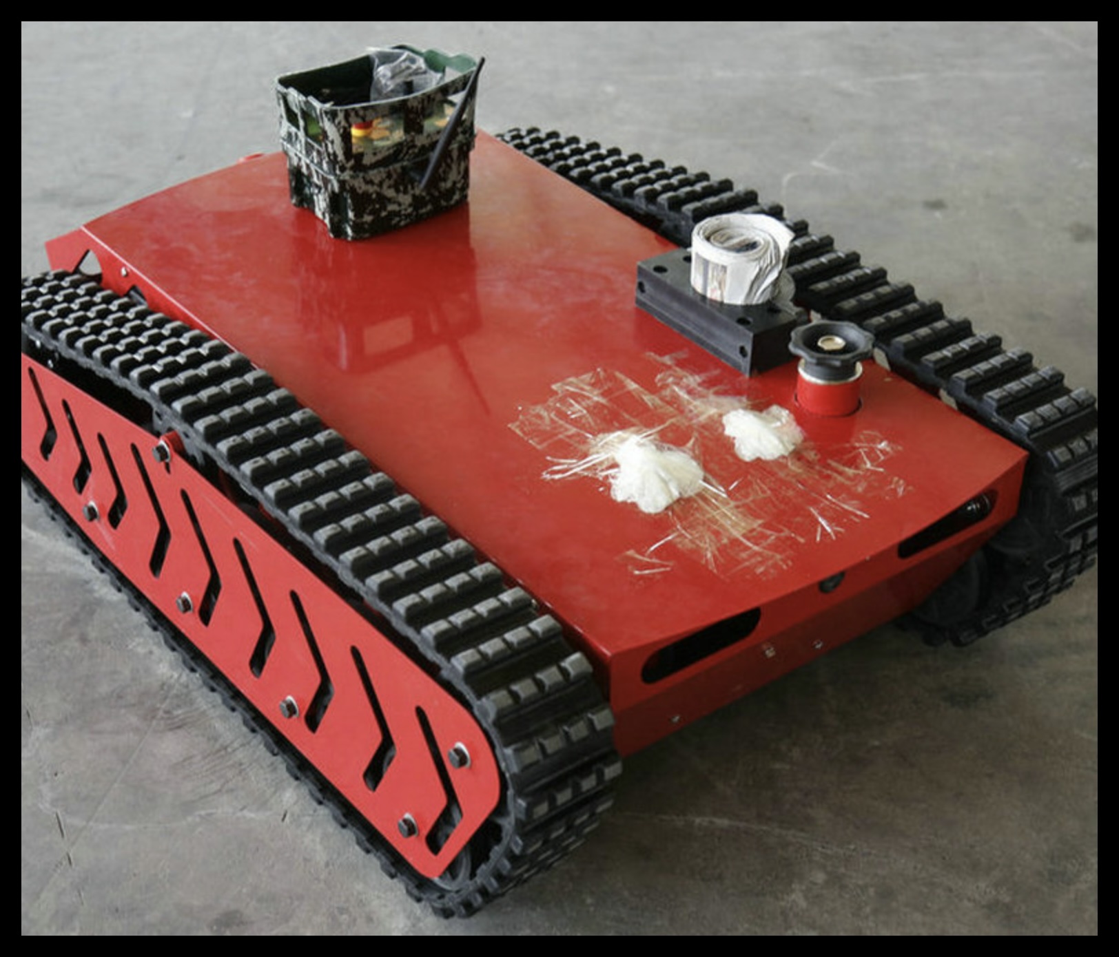 Intelligent Remote-Controlled Firefighting Robot with Tracked Chassis Mobility 