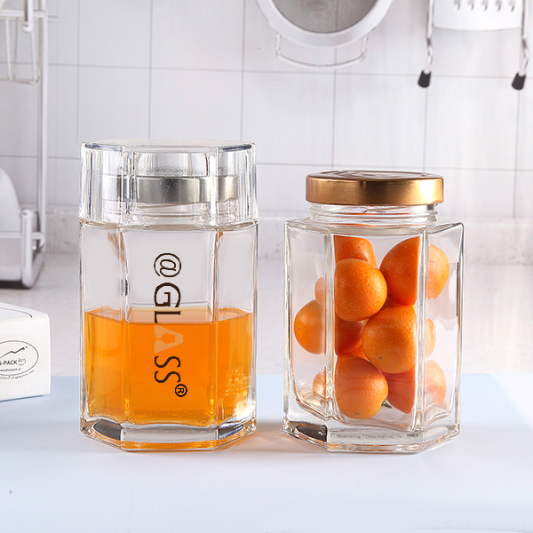 Hot Sale Wholesale Hexagonal Glass Honey Container Honey Storage jar with lids 
