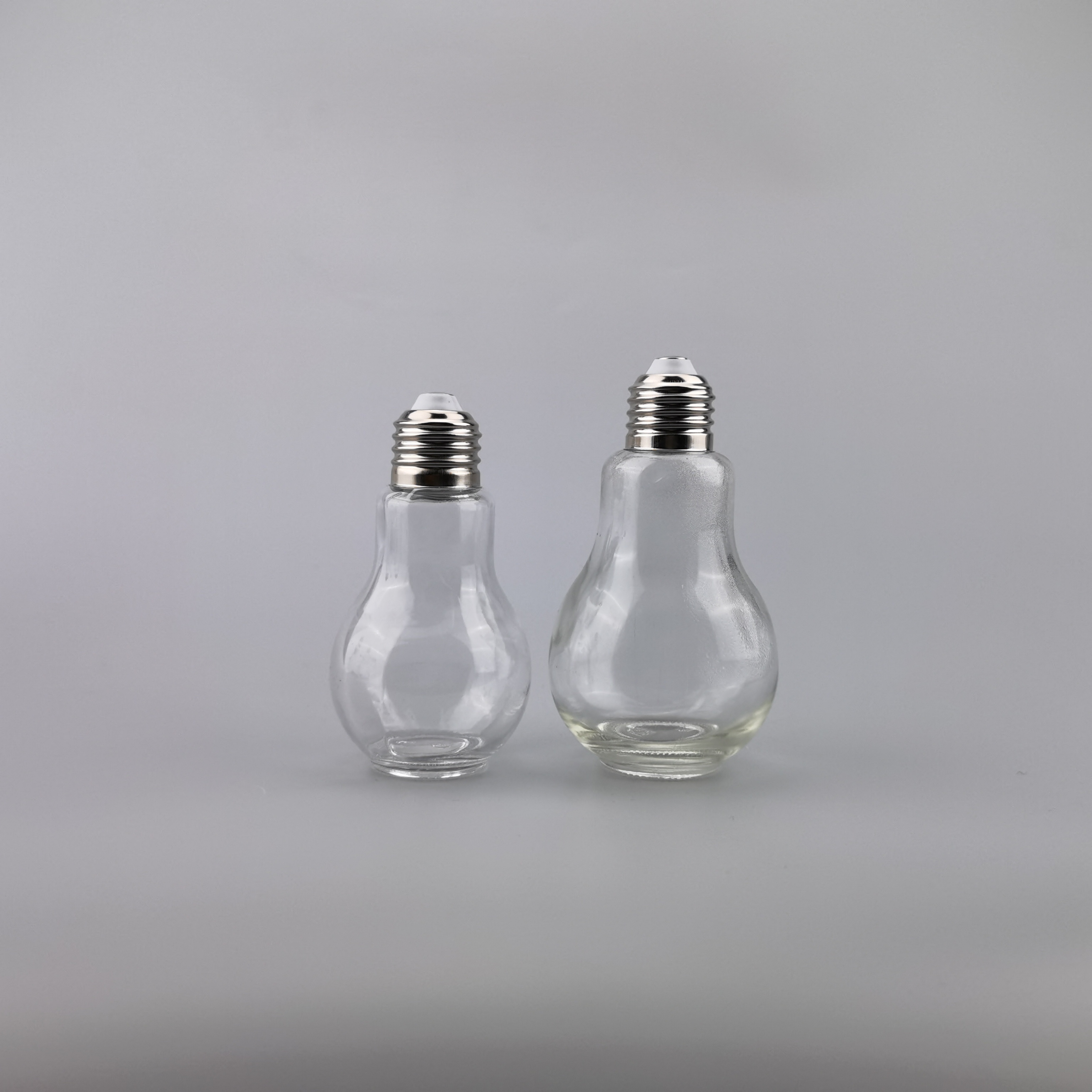 110ml Light Bulb Shape Glass Drinking Bottle for Packing with Metal Cap 