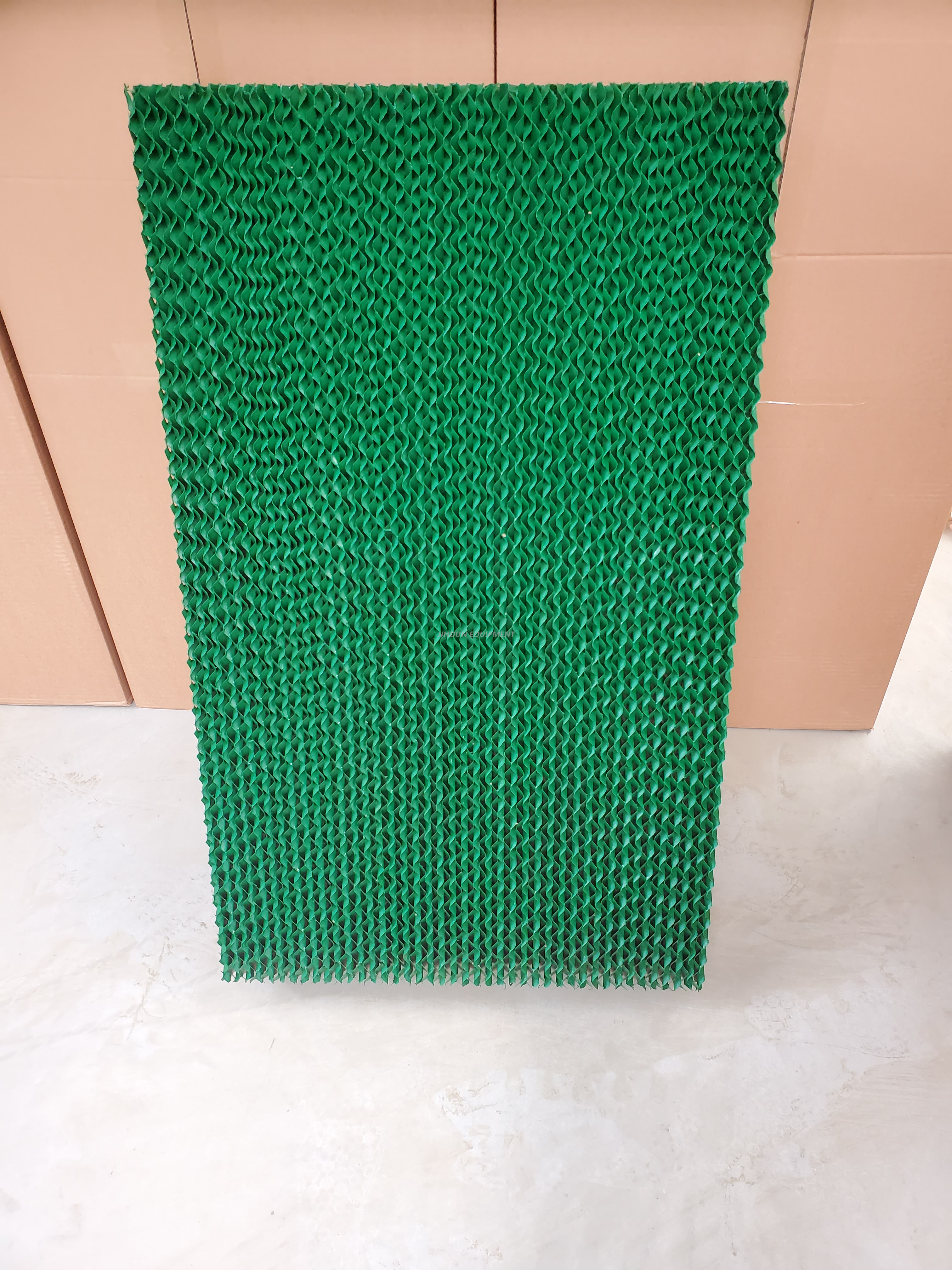 Cooling pad for greenhouse/poultry farm