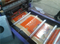Printing and packaging machinery using aluminum guide roller