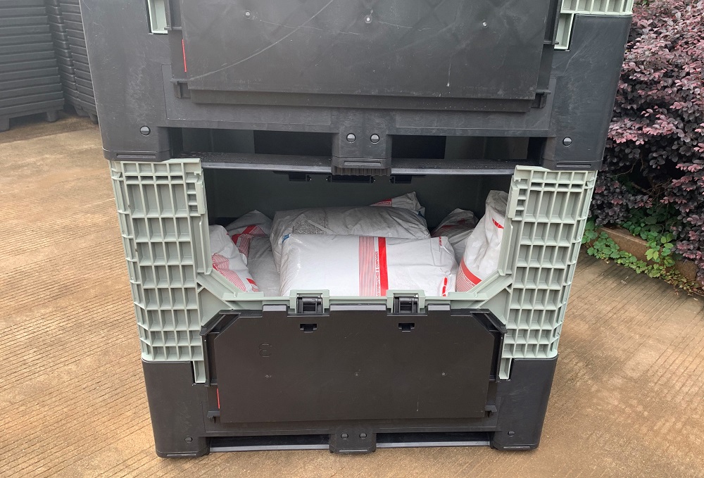 Caja de paletas de plástico plegable y resistente con tapa