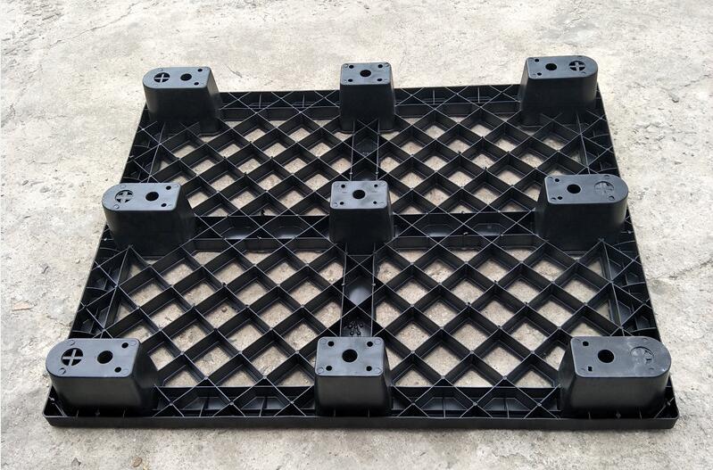 1200 x 1000 Tarimas de plástico negras para envíos internacionales de uso liviano