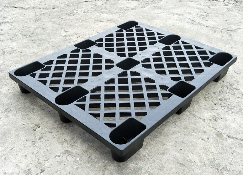 1200 x 1000 Tarimas de plástico negras para envíos internacionales de uso liviano